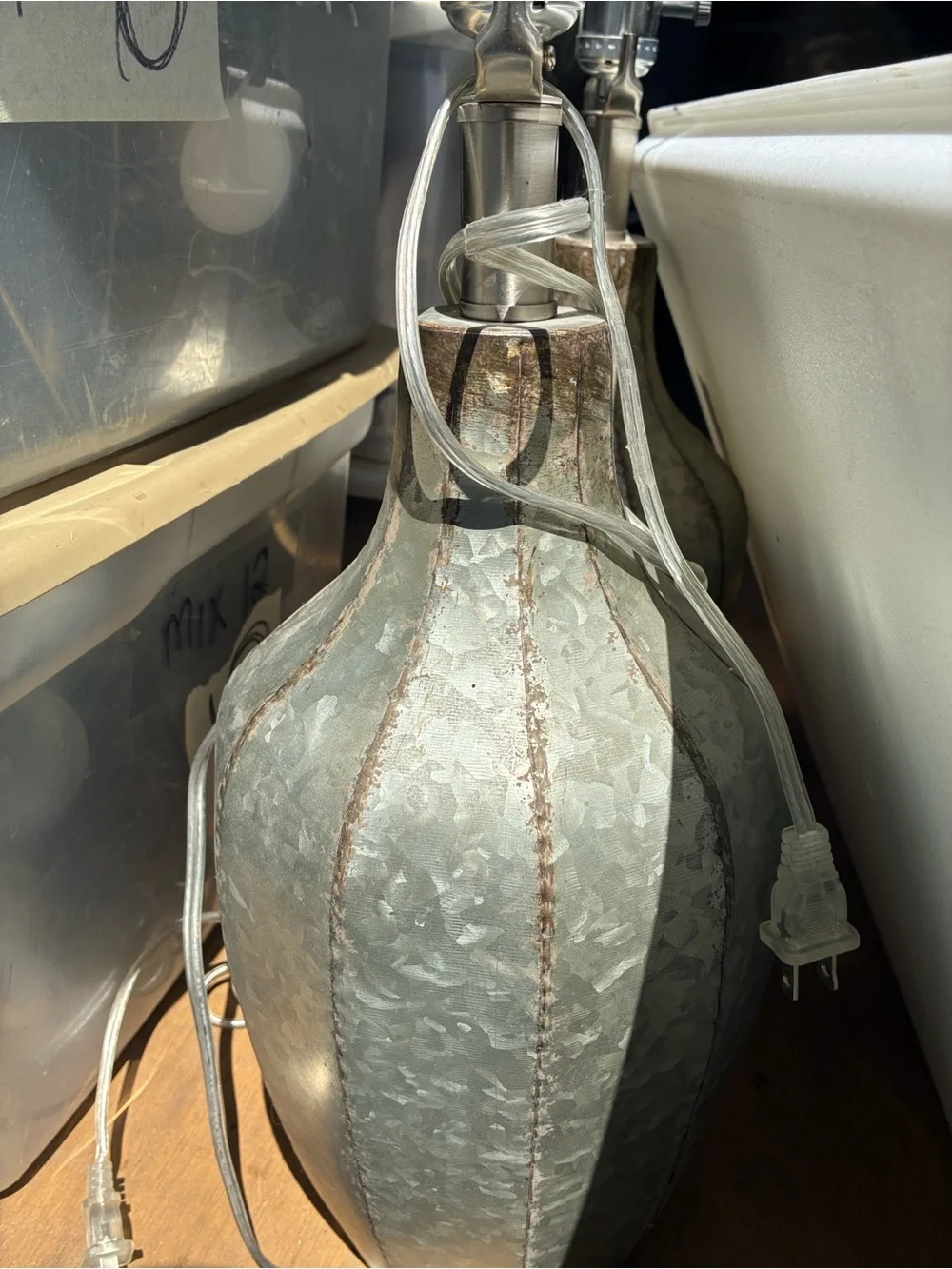 rustic table lamps feature galvanized metal bodies w/distinctive textured finish